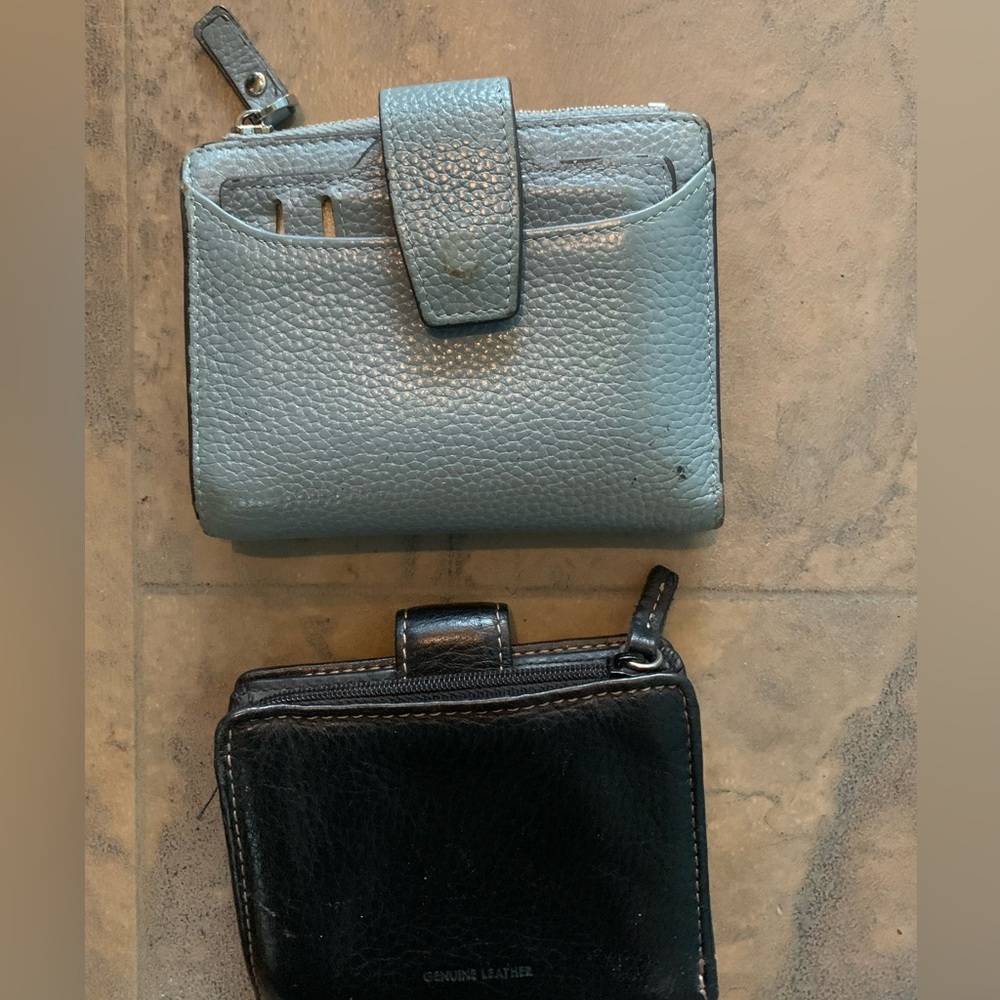 Lot of two wallets black leather and blue billfold.